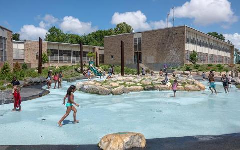 Children playing at the Joslin Spray Park in Providence