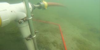 underwater suction hose and pipe connected