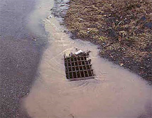 muddy storm drain