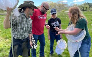 Pollinator Atlas Entomologist, Dr. Katie Burns, showing a bee to community scientists during a Rhode Island Bumblebee Survey volunteer training event
