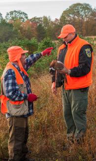 Environmental Police Officer checks small game possession size and limits