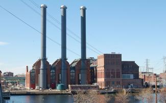 Close up of the three smoke stacks at the Manchester Street Power Station in Providence