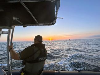 Environmental Police Officer Anthony Sullivan patrolling RI waters.