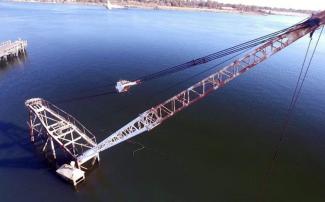 Aerial view of the derelict, sunken crane-topped barge in the Providence River