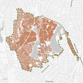 Map showing the impervious cover in orange within the Mashapaug Watershed